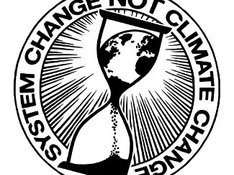 Eine Sanduhr mit verrinnender Erdkugel und Schrift "System change not climate change"
